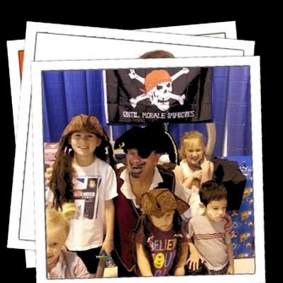 Pirate entertainer with a group of kids