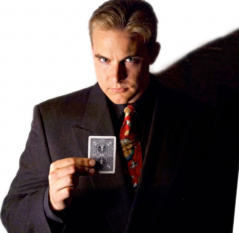 Magician performing on stage